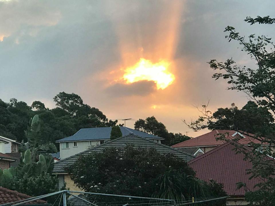 The sunset above surburban homes in Sydney, Australia (Santino Ruisi )