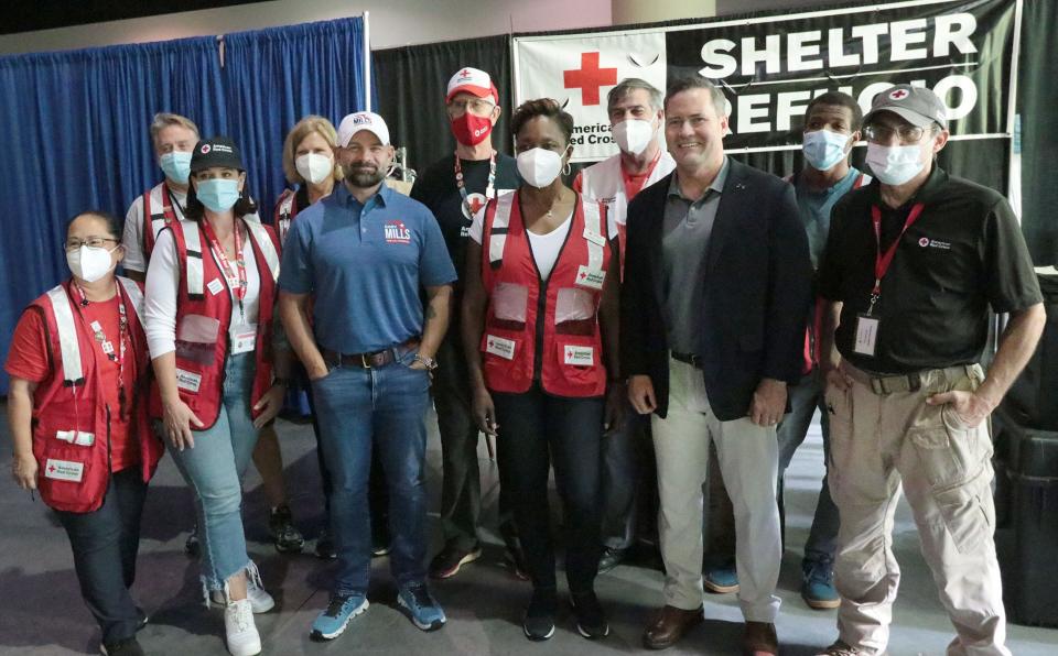 Florida Congressman Michael Waltz and congressional candidate Cory Mills visit with the staff of the Red Cross shelter, Wednesday October 5, 2022 while the congressman visits people displaced from the hurricane now staying at the Red Cross shelter setup in the Ocean Center.