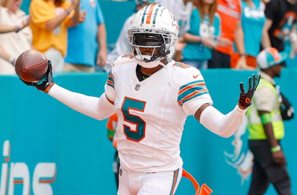 Miami Dolphins cornerback Jalen Ramsey (5) celebrates after intercepting a pass during the game against the New England Patriots in the second quarter at Hard Rock Stadium in Miami Gardens on Sunday, October 29, 2023.