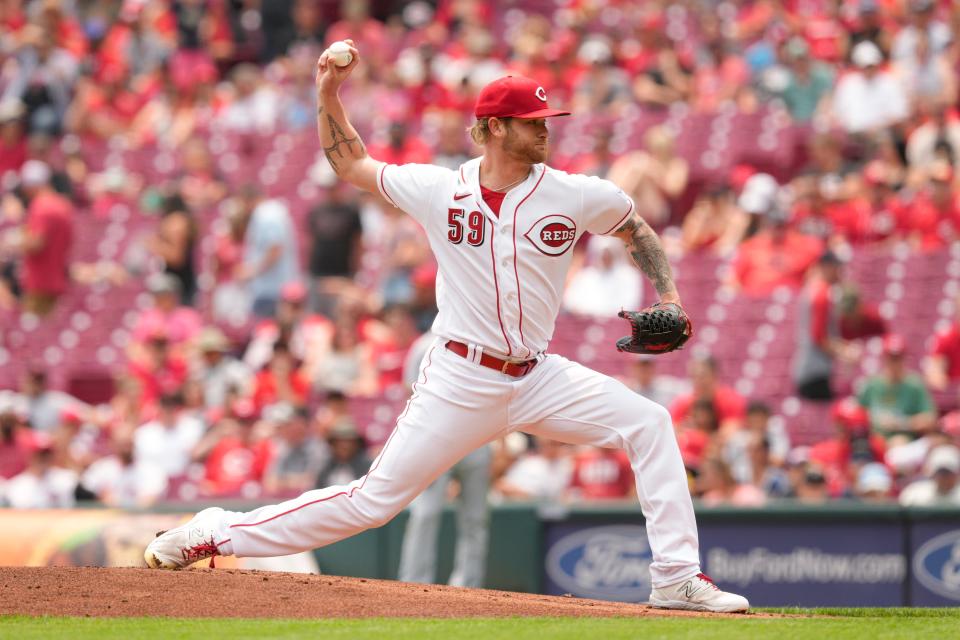 Cincinnati Reds starting pitcher Ben Lively throws against the Milwaukee Brewers in the first inning of a baseball game in Cincinnati, Sunday, June 4, 2023.
