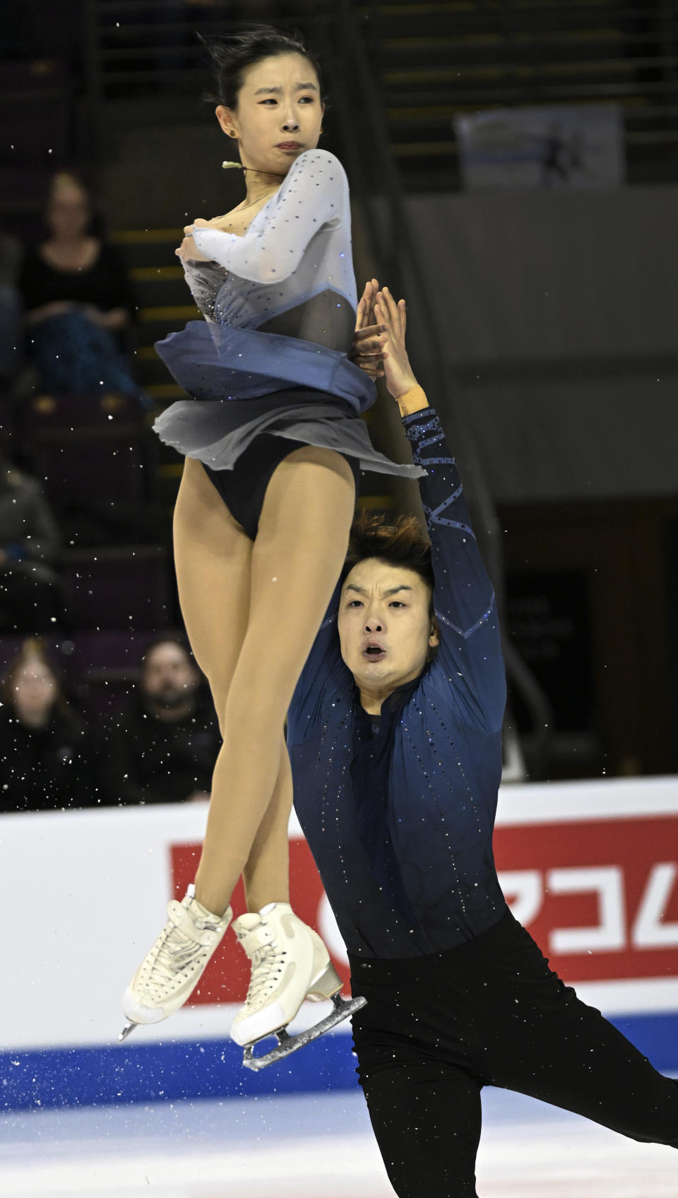 Siyang Zhang and Yongchao Yang of China compete in the pairs free skating at the Four Continents Figure Skating Championships, Saturday, Feb. 11, 2023, in Colorado Springs, Colo. (Christian Murdock/The Gazette via AP)