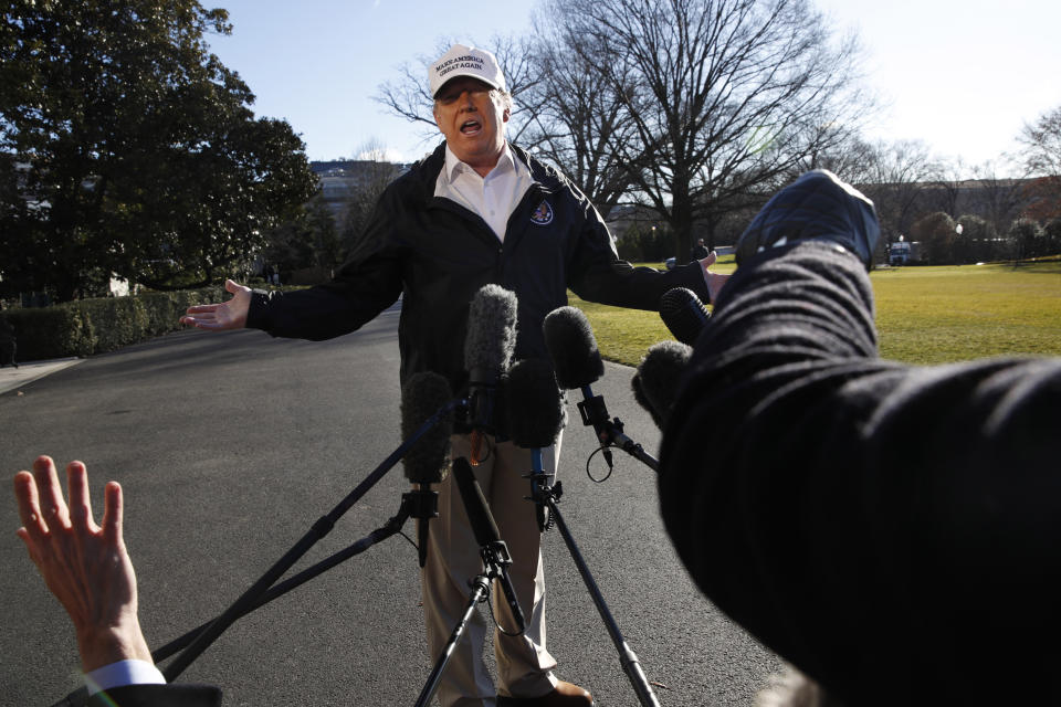 President Donald Trump gestures as reporters raise their hands while he speaks to the media on the South Lawn of the White House, Thursday Jan. 10, 2019, in Washington, en route for a trip to the border in Texas as the government shutdown continues. (AP Photo/Jacquelyn Martin)