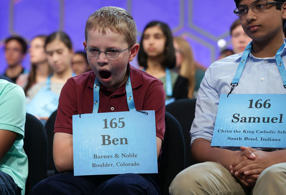 <p>Ben Lenger of Niwot, Colorado, yawns as he waits on stage during round two of 2017 Scripps National Spelling Bee at Gaylord National Resort & Convention Center May 31, 2017 in National Harbor, Maryland. Close to 300 spellers are competing in the annual spelling contest for the top honor this year. (Alex Wong/Getty Images) </p>