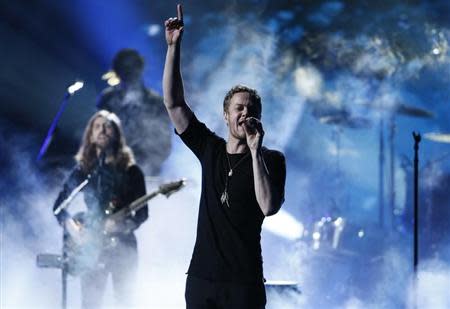 Dan Reynolds of Imagine Dragons performs a medley at the 41st American Music Awards in Los Angeles, California November 24, 2013. REUTERS/Lucy Nicholson