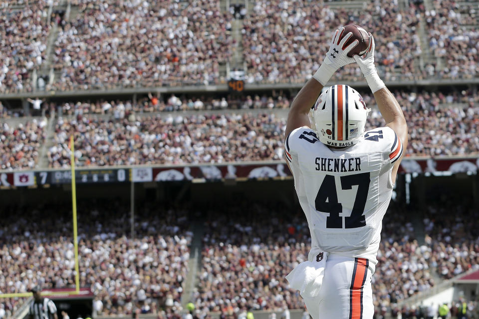 Auburn tight end John Samuel Shenker (47) catches a pass in the end zone for a touchdown against Texas A&M during the first half of an NCAA college football game, Saturday, Sept. 21, 2019, in College Station, Texas. (AP Photo/Sam Craft)