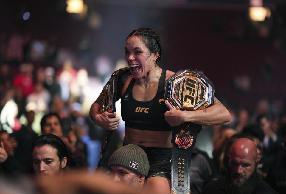 Amanda Nunes celebrates after defeating Irene Aldana during a UFC 289 women's bantamweight title bout and then announcing her retirement, in Vancouver, British Columbia, on Saturday, June 10, 2023. (Darryl Dyck/The Canadian Press via AP)