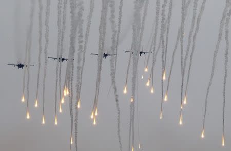 Jet fighters releases flares during the Zapad 2017 war games at a range near the town of Borisov, Belarus September 20, 2017. REUTERS/Vasily Fedosenko