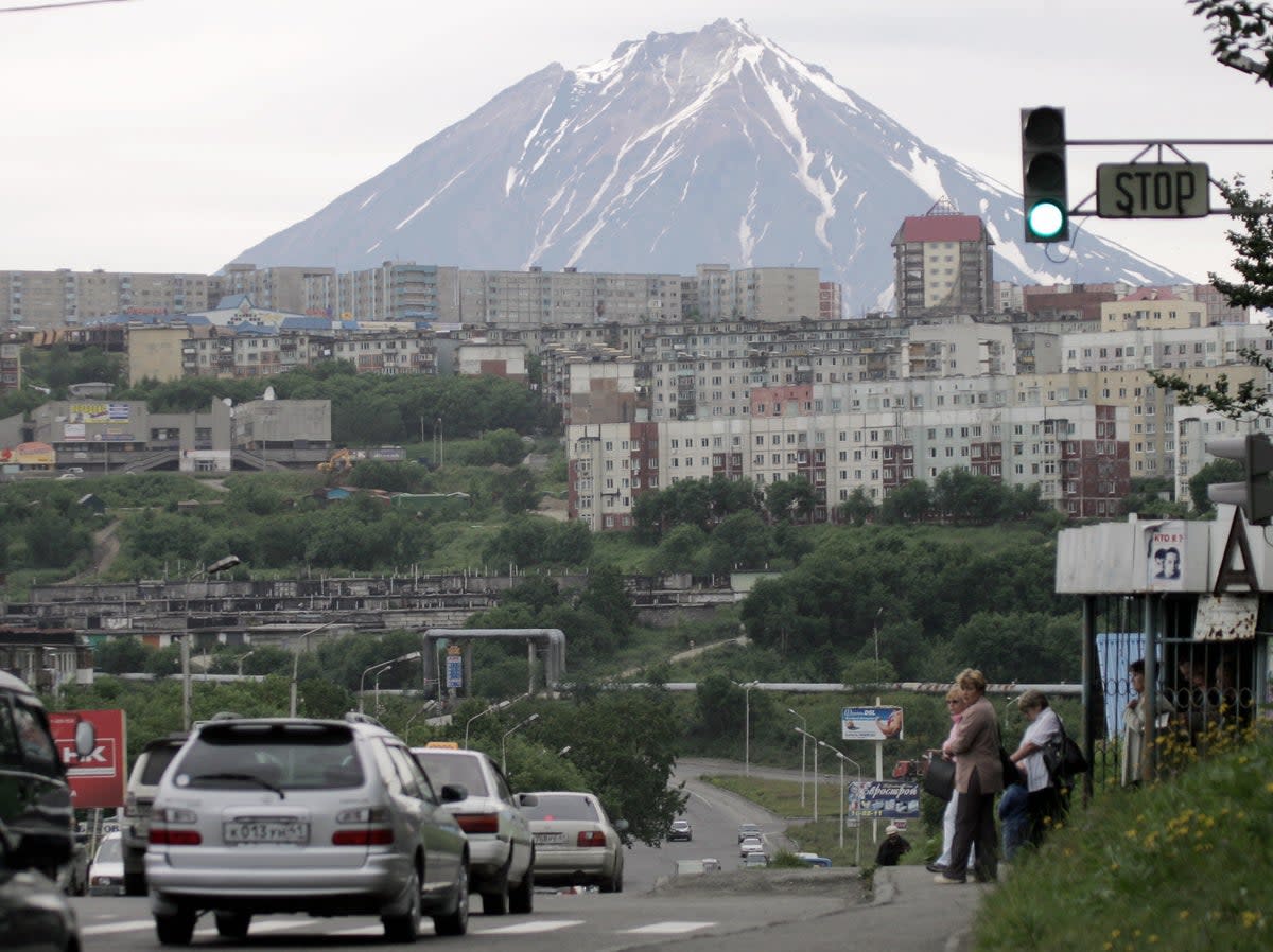 File photo shows a view of Petropavlovsk-Kamchatsky city with Klyuchevskaya Sopka mountain on the background (AFP via Getty Images)