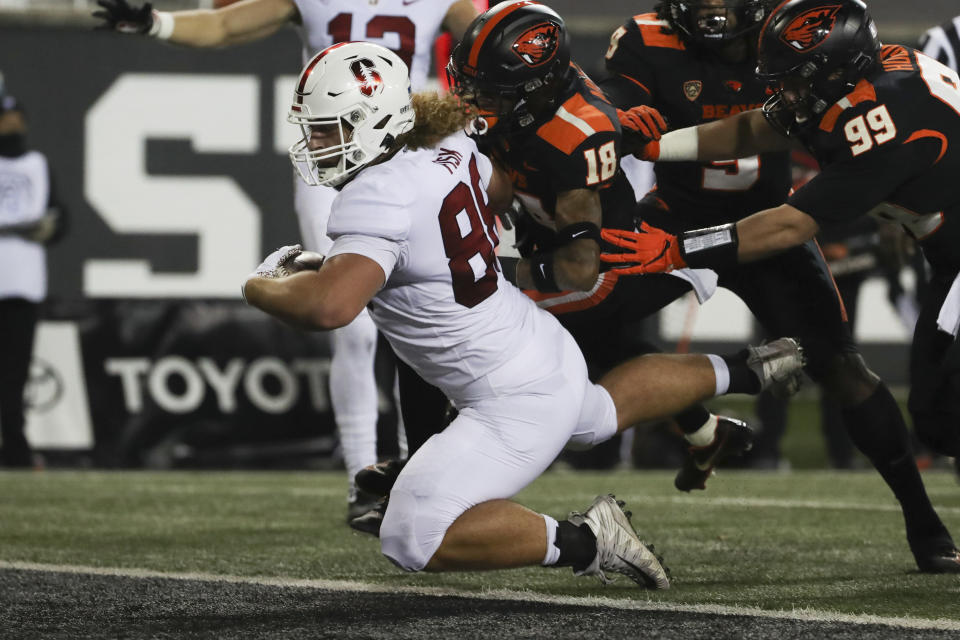 Stanford tight end Tucker Fisk (88) lands in the end zone for a touchdown during the first half of the team's NCAA college football game against Oregon State in Corvallis, Ore., Saturday, Dec. 12, 2020. (AP Photo/Amanda Loman)