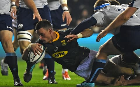 South Africa's centre Jesse Kriel dives over the line to score the opening try of the autumn international rugby union test match between Scotland and South Africa at Murrayfield - Credit: Getty images