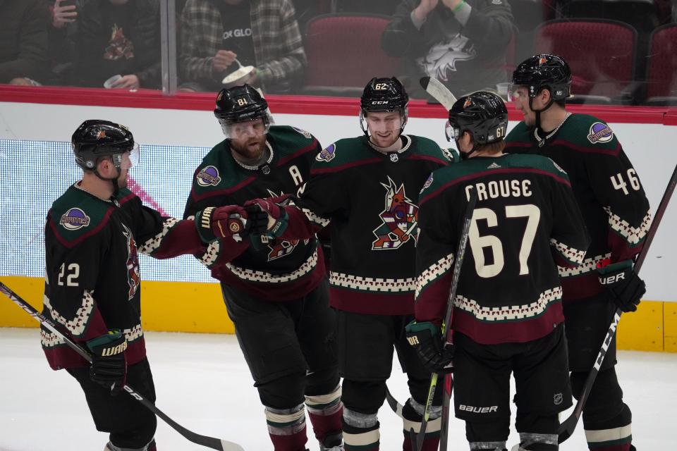 Jan 17, 2022; Glendale, Arizona, USA; Arizona Coyotes defenseman Janis Moser (62) celebrates his goal against the Montreal Canadiens during the second period at Gila River Arena. Mandatory Credit: Joe Camporeale-USA TODAY Sports