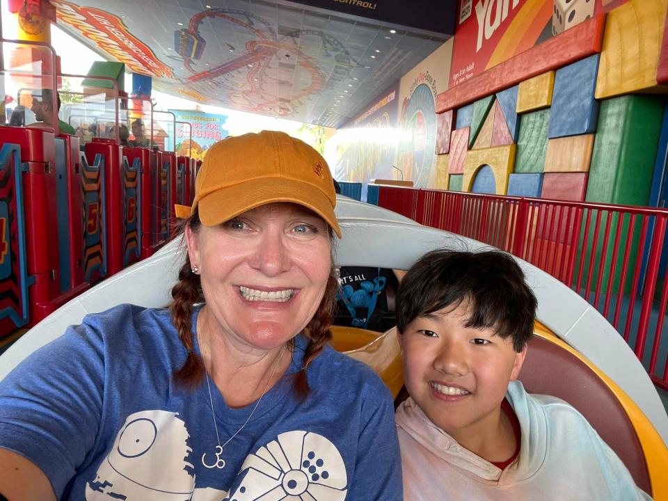 Jill and her son riding slinky dog dash at disney world