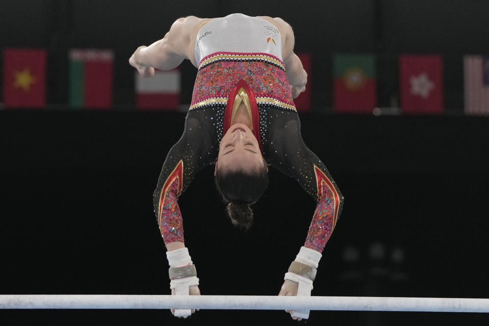 Nina Derwael of Belgium, performs on the uneven bars during the artistic gymnastics women's apparatus final at the 2020 Summer Olympics, Sunday, Aug. 1, 2021, in Tokyo, Japan. (AP Photo/Natacha Pisarenko)