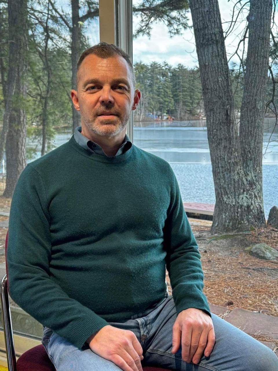 Brian Dumont, seen here at his home at Sand Pond in Sanford, Maine, is the president of the newly formed Sanford Pond Association, LLC, which is engaged in efforts to prevent a local landowner from building a new campground at the pond.