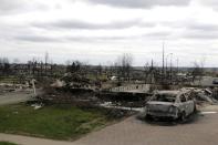 Destroyed property in Fort McMurray, Alberta, is viewed Monday, May 9, 2016. (AP Photo/Rachel La Corte)