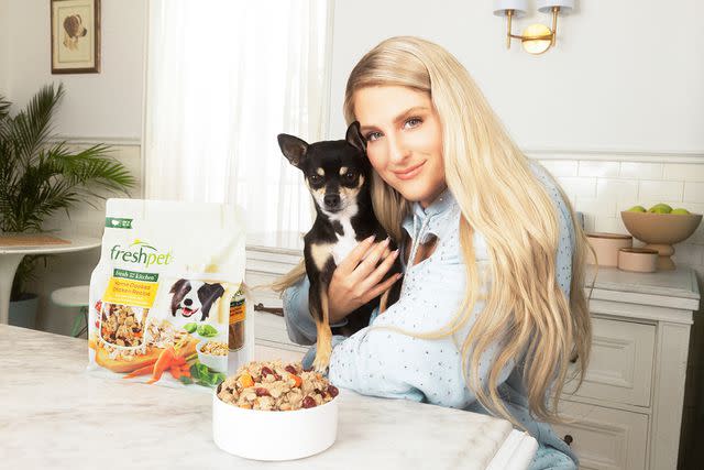 <p>Lauren Dunn</p> Meghan Trainor, the new ambassador for Freshpet, with one of her four dogs