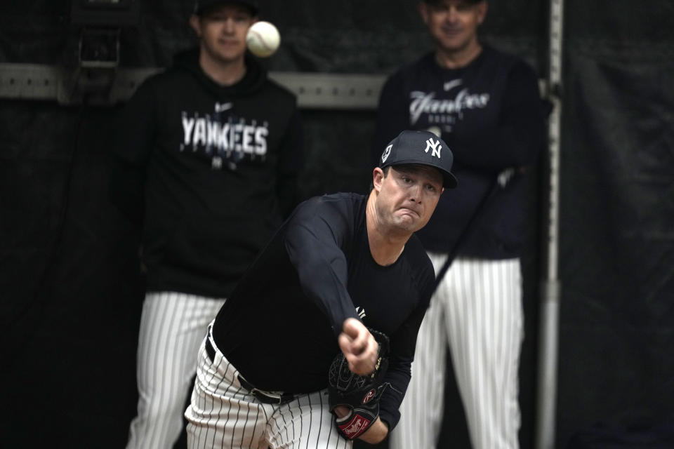 New York Yankees starting pitcher Gerrit Cole throws during a baseball spring training workout Thursday, Feb. 15, 2024, in Tampa, Fla. (AP Photo/Charlie Neibergall)