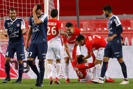 Soccer Football - Coupe de la Ligue Semi Final - AS Monaco vs Montpellier - Stade Louis II, Monaco - January 31, 2018 Monaco's Radamel Falcao celebrates scoring their first goal with team mates REUTERS/Eric Gaillard