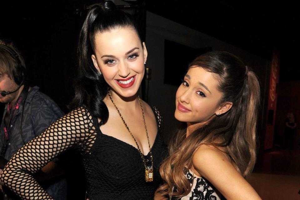 <p>Kevin Mazur/WireImage</p> Katy Perry and Ariana Grande backstage at the MTV EMA