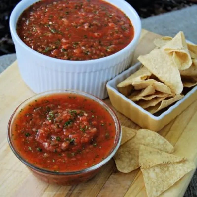 <p>Krista Marshall</p><p>Make a huge batch of this salsa in the food processor in about five minutes. Perfect with those keto tortilla chips!</p><p><strong>Get the recipe: <a href="https://parade.com/887829/kristamarshall/its-not-a-party-without-this-restaurant-quality-salsa/" rel="nofollow noopener" target="_blank" data-ylk="slk:Restaurant-Style Salsa;elm:context_link;itc:0;sec:content-canvas" class="link rapid-noclick-resp">Restaurant-Style Salsa</a></strong></p>