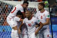 <p>Wahbi Khazri (10) celebrates with his teammates after putting Tunisia 2-1 up </p>