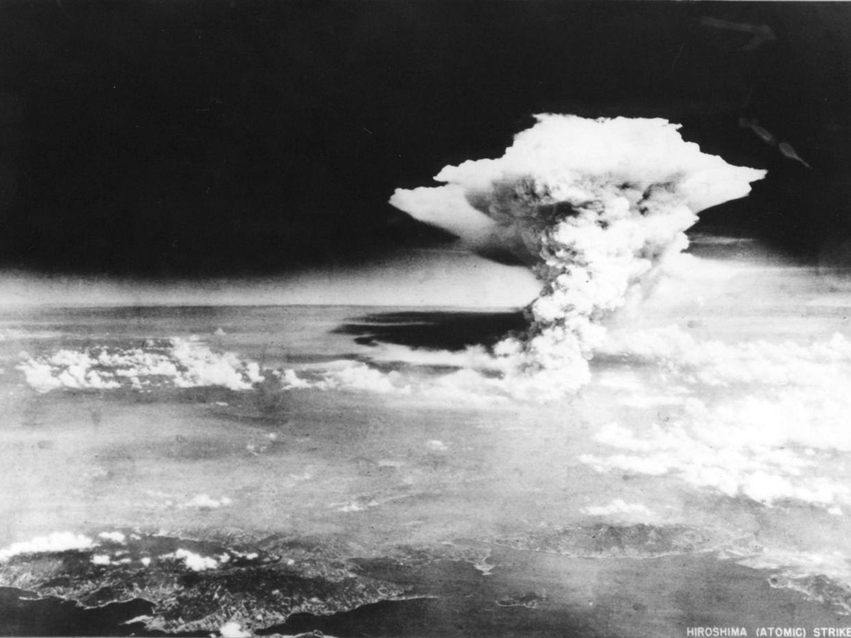 Photograph taken on 6 August 1945 by the US Army and released via the Hiroshima Peace Memorial Museum shows a mushroom cloud caused by the atomic bomb dropped by the B-29 bomber Enola Gay over the city of Hiroshima: US ARMY/AFP/Getty