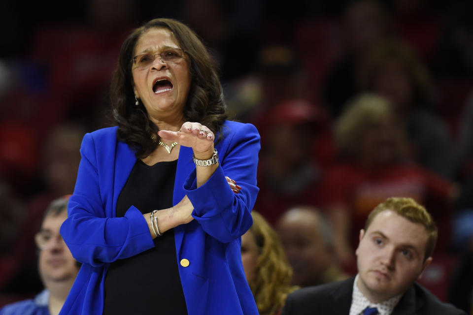 FILE - In this Dec. 31, 2018, file photo, Rutgers coach C. Vivian Stringer directs her team during the first half of an NCAA college basketball game against Maryland, in Baltimore. In the 2020-21 basketball season, Stringer will be entering her 50th season as a college coach, including the last 26th at Rutgers. The Hall of Famer will be the first NCAA women’s basketball coach ever to coach 50 seasons and just the fourth men’s or women’s basketball coach in any NCAA division to reach that milestone. (AP Photo/Gail Burton, File)