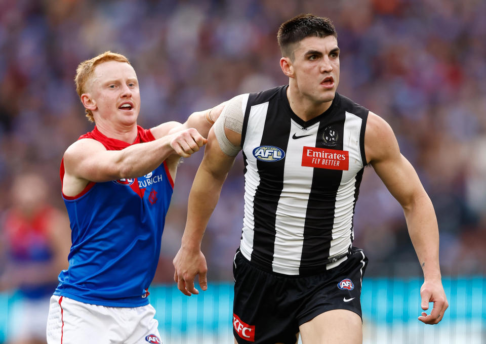 MELBOURNE, AUSTRALIA - JUNE 10: Jake Bowey of the Demons and Brayden Maynard of the Magpies clash during the 2024 AFL Round 13 match between the Collingwood Magpies and the Melbourne Demons at The Melbourne Cricket Ground on June 10, 2024 in Melbourne, Australia. (Photo by Michael Willson/AFL Photos via Getty Images)