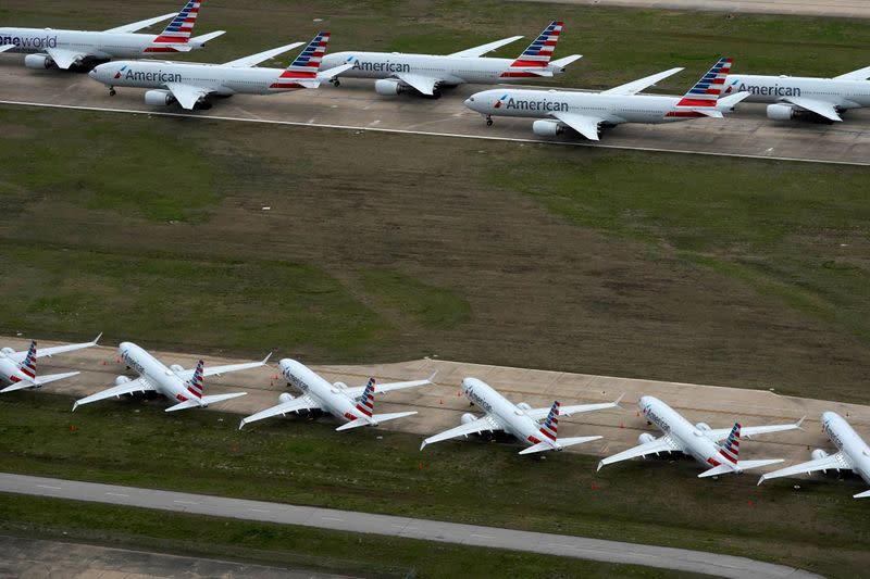 FILE PHOTO: American Airlines passenger planes crowd a runway in Tulsa