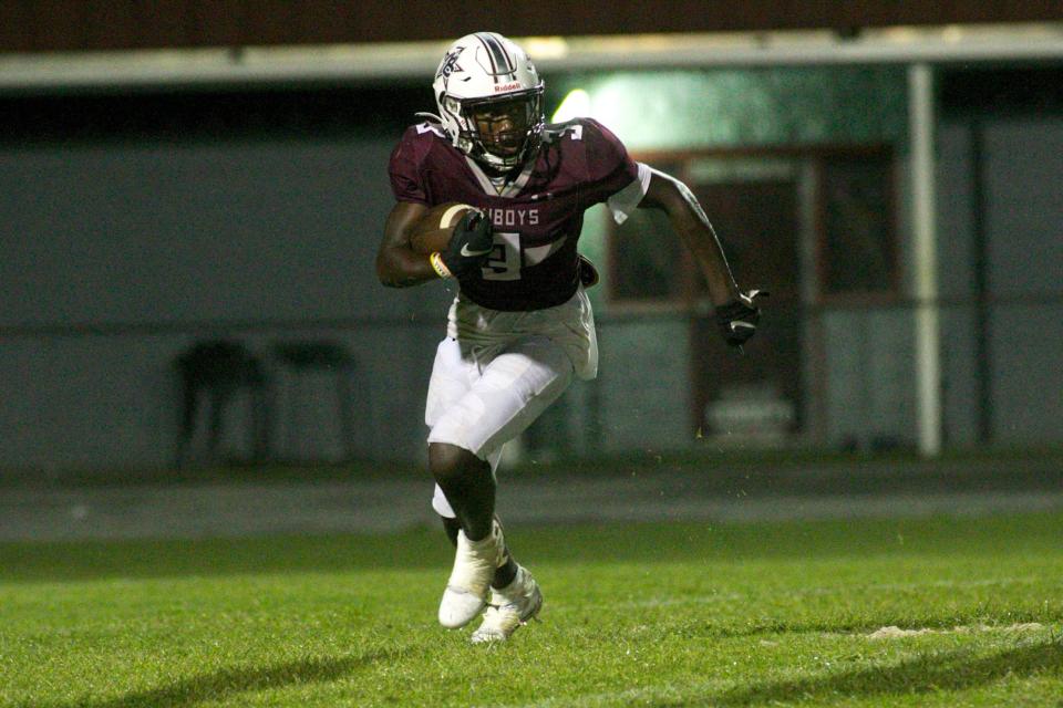 Madison County senior wide receiver Tony Hamilton (3) rushes the ball in a game against Wakulla on Aug. 20, 2022, at Boot Hill. The Cowboys won, 25-14.