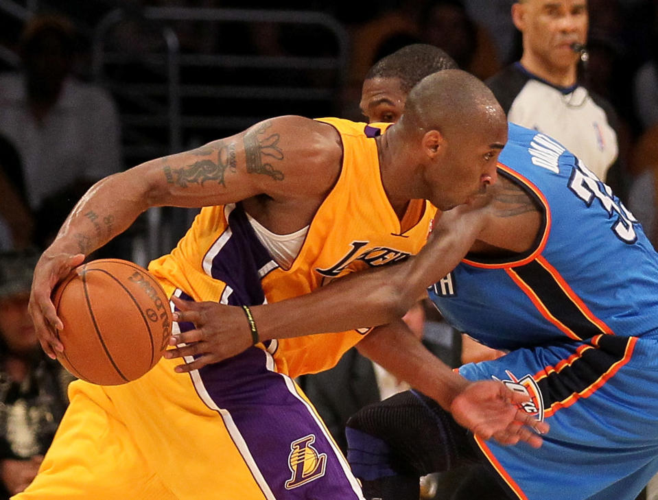Lakers guard Kobe Bryant drives on Thunder forward Kevin Durant on May 19 at Staples Center in Los Angeles. (Photo by Stephen Dunn/Getty Images)