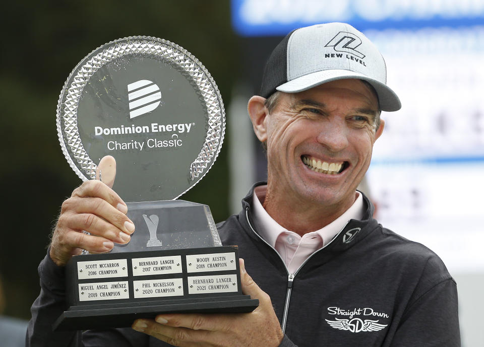 Steven Alker lifts the trophy after winning the Dominion Energy Charity Classic golf tournament at The Country Club of Virginia in Richmond, Va., Sunday, Oct. 23, 2022. (Alexa Welch Edlund/Richmond Times-Dispatch via AP)