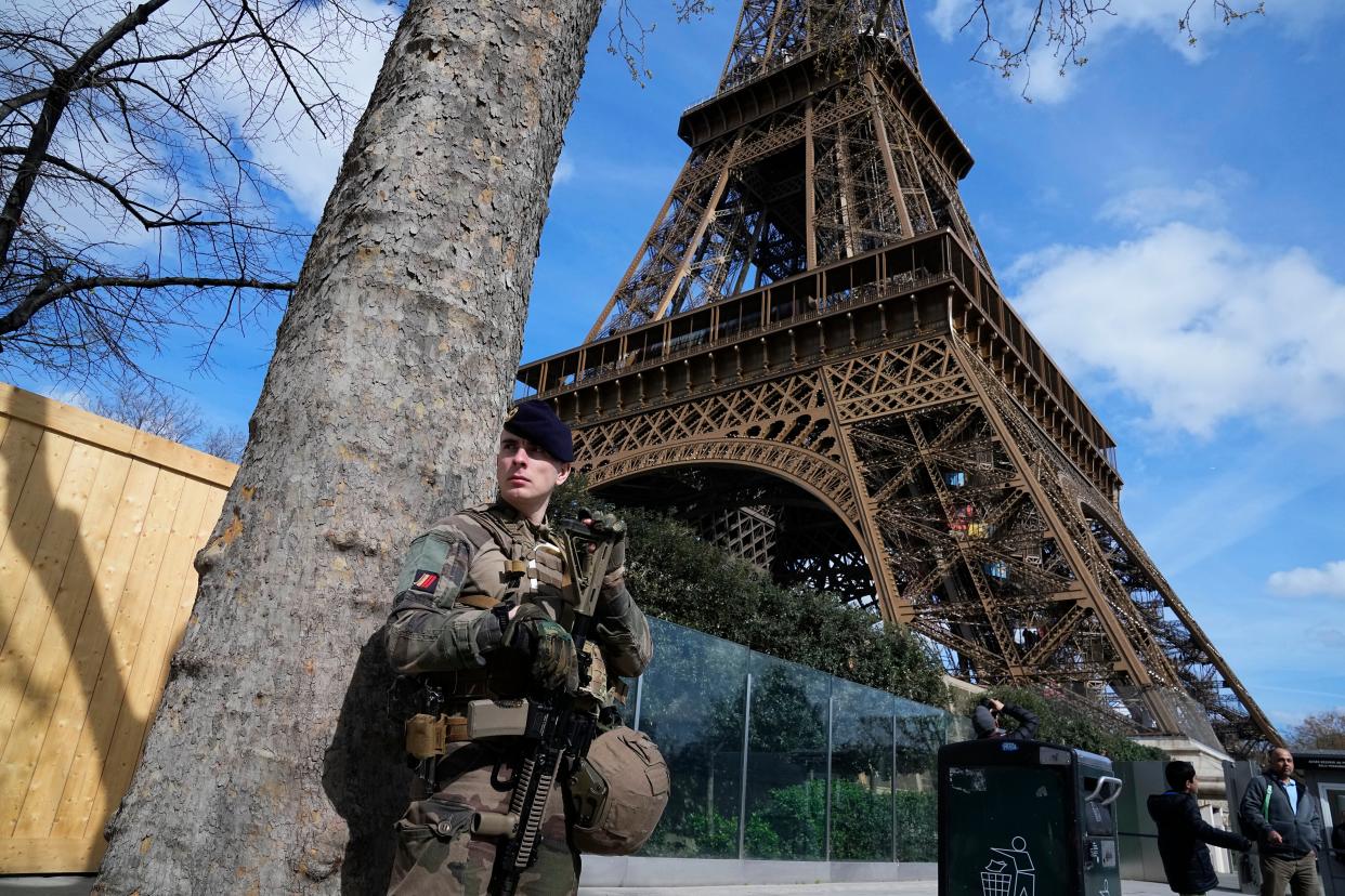A soldier patrols at the Eiffel Tower, Monday, March 25, 2024 in Paris (AP)