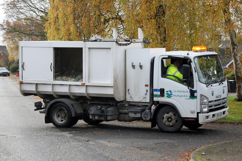 A recycling lorry en route to collect waste from homes in Ruthin