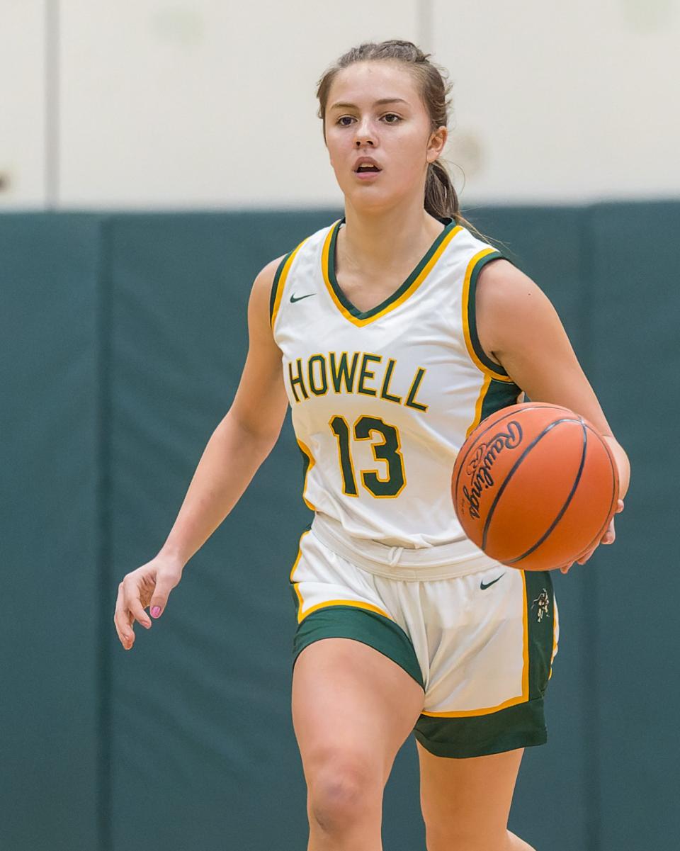 Howell's Gabby Piepho brings the ball up the court during a victory over Williamston Tuesday, Dec. 5, 2023.