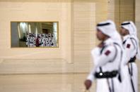 Guards attend a cermony with French President Francois Hollande and Qatar's Emir Sheikh Tamim bin Hamad al-Thani, at the Diwan Palace in Doha, on May 4, 2015