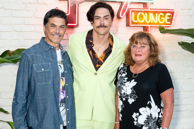 <p>Amanda Edwards/Getty</p> Tom Sandoval with his parents Tony Sandoval and Terri Green