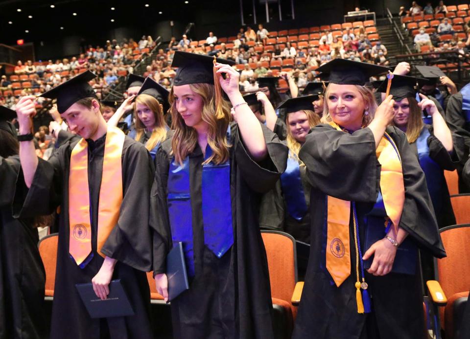 Switching their tassels from right to left, the 2022 York County Community College graduates participate in the 27th annual commencement event May 13, 2022.