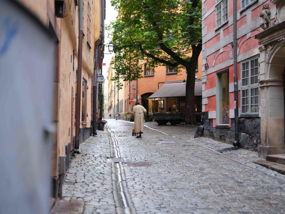 Woman walking through the streets of Stockholm