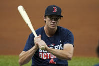 Boston Red Sox first baseman Bobby Dalbec holds a bat during the baseball team's practice Wednesday, Oct. 6, 2021, in St. Petersburg, Fla., for an AL Division Series matchup against the Tampa Bay Rays that starts Thursday. (AP Photo/Chris O'Meara)