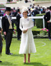 <p>We know Princess Kate l<a href="https://ca.style.yahoo.com/times-duchess-cambridge-worn-her-174744439.html" data-ylk="slk:oves to repurpose her favourite looks;elm:context_link;itc:0;sec:content-canvas;outcm:mb_qualified_link;_E:mb_qualified_link;ct:story;" class="link  yahoo-link">oves to repurpose her favourite looks</a> – but she picked up a new number for the Royal Ascot earlier this week. She stunned in a white lace Dolce & Gabbana midi frock, topping things off with a pretty fascinator. <i>(Photo by Chris Jackson/Getty Images)</i><br></p>