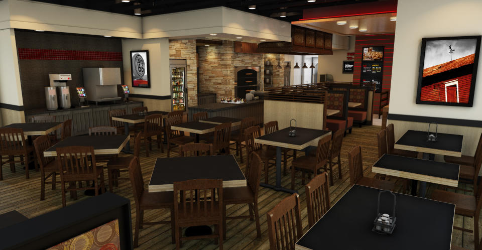 This handout image provided by Pizza Hut, shows a rendering of a new Pizza Hut in York, Neb. Pizza Hut announced Monday, Jan. 13, 2014, it plans to start offering pizza by the slice for the first time in two test locations this week, as the chain looks to keep pace with trendy competitors offering quick, made-to-order pies. (AP Photo/Pizza Hut)