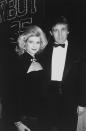 <p>Real estate developer Donald Trump with wife Ivana attend a party for 35th anniversary of <em>Playboy</em> on Dec. 1, 1988. (Photo: Robin Platzer/Twin Images/The Life Images Collection/Getty Images) </p>