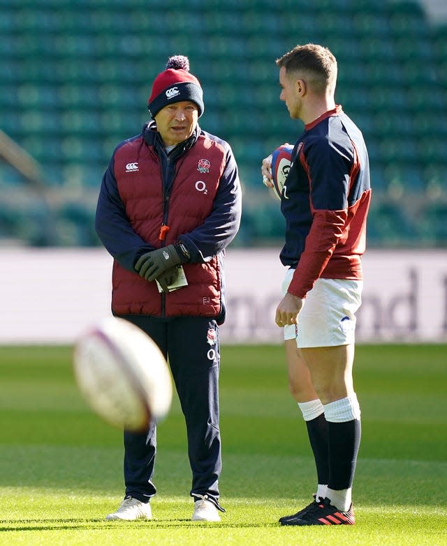 George Ford, right, talks to Eddie Jones