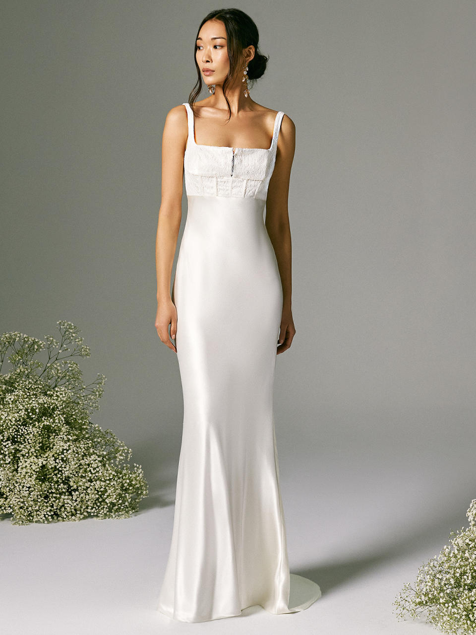 <p>Brides taking a less-is-more approach to their big-day attire, put <a href="https://www.savannahmiller.com/" rel="nofollow noopener" target="_blank" data-ylk="slk:Savannah Miller;elm:context_link;itc:0;sec:content-canvas" class="link ">Savannah Miller</a> at the top of your list. The designer's consistent dedication to simplicity makes her a favorite amongst minimalist women. Take the "Lorien" gown, from the creative's Spring 2022 collection, for example: With a balconette neckline, corset bodice, and hook-and-eye fastening, the free-flowing dress is streamlined and intriguing.</p>