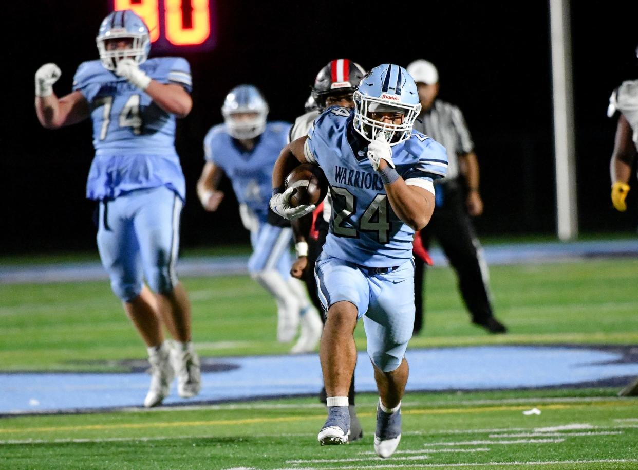 Central Valley's Jance Henry sprints to the end zone during Friday night's game against Aliquippa.