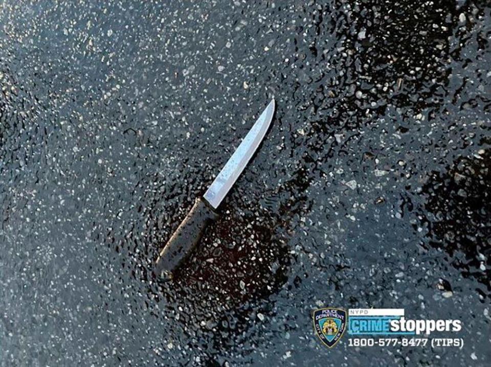 This photo provided by New York City Police Dept. shows a knife recovered at a crime scene in the far Rockaway section of the Queens borough of New York on Sunday, Dec. 3, 2023. A man killed four relatives, including two children, in a knife attack at their New York City home early Sunday, then set the building on fire and stabbed two police officers before one of them fatally shot him, officials said. (NYPD via AP) ORG XMIT: NYHO101