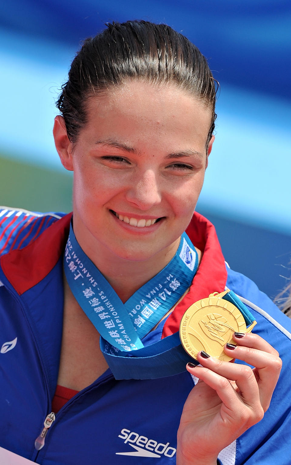 Britain's Keri-Anne Payne smiles after winning the women's 10km open water swimming event of the FINA World Championships in Shanghai on July 19, 2011. Payne, who took silver at the 2008 Beijing Games, swam the women's 10km open water in 2hr 1min 58.1secs, ramping up hopes for London 2012.  AFP PHOTO/PHILIPPE LOPEZ (Photo credit should read PHILIPPE LOPEZ/AFP/Getty Images)