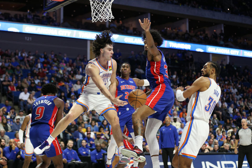 Oct 19, 2023; Tulsa, Oklahoma, USA; Oklahoma City Thunder guard Josh Giddey (3) passes around Detroit Pistons forward <a class="link " href="https://sports.yahoo.com/nba/players/5959" data-i13n="sec:content-canvas;subsec:anchor_text;elm:context_link" data-ylk="slk:Marvin Bagley III;sec:content-canvas;subsec:anchor_text;elm:context_link;itc:0">Marvin Bagley III</a> (35) in the second half at BOK Center. Mandatory Credit: Joey Johnson-USA TODAY Sports