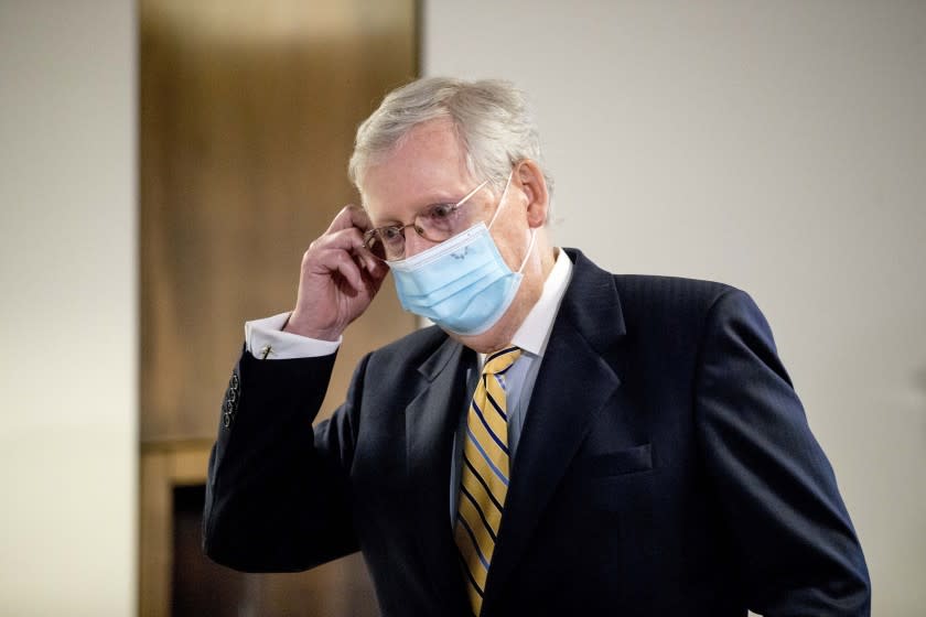 Senate Majority Leader Mitch McConnell, R-Ky., arrives to speak to reporters during a news conference following a Senate policy luncheon on Capitol Hill, Tuesday, June 16, 2020, in Washington. (AP Photo/Andrew Harnik)